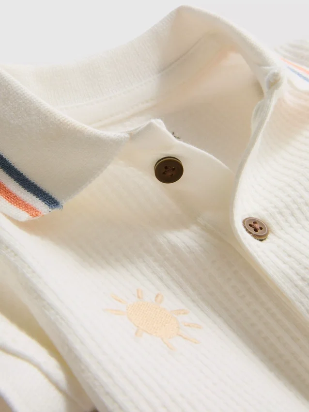 0-18mths | textured newborn romper