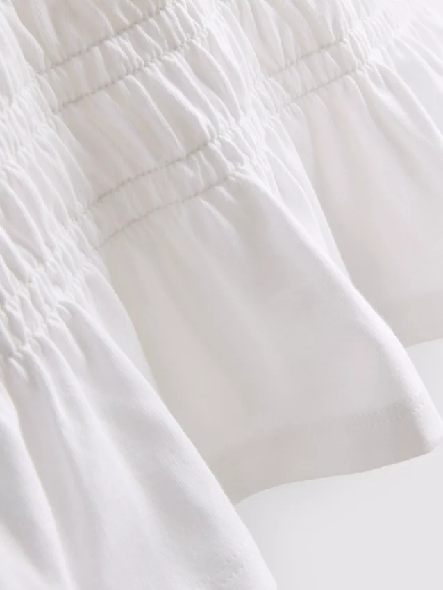7-15yrs | shirred peplum t-shirt