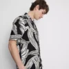 Abstract leaf short sleeve shirt