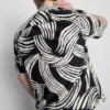 Abstract leaf short sleeve shirt