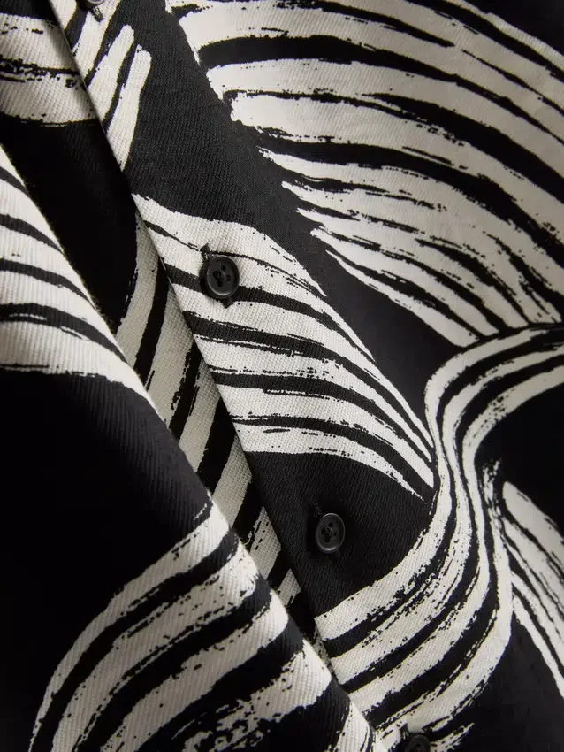 Abstract leaf short sleeve shirt
