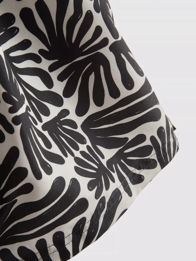 Abstract-print swim shorts