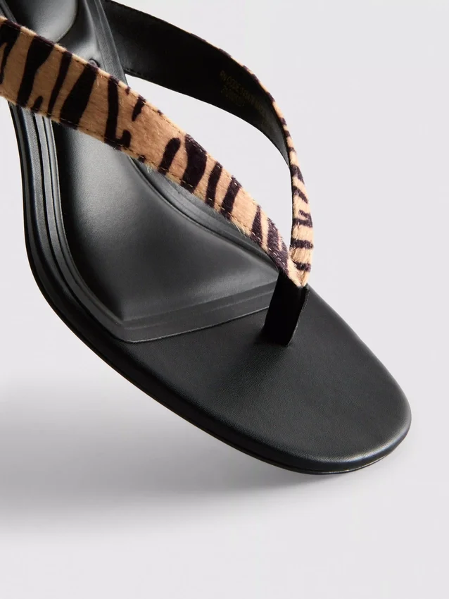 Animal pattern toe post heeled mules