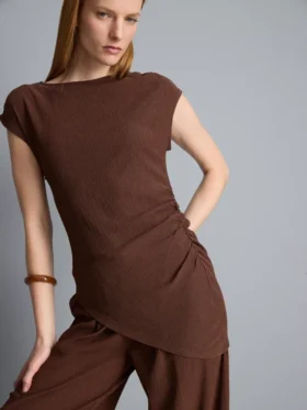 Asymmetric crinkle top