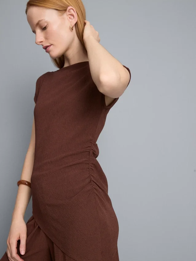 Asymmetric crinkle top