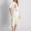 Bouffants and broken hearts cotton croissant t-shirt