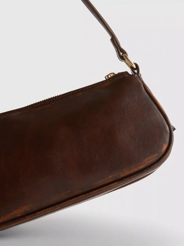 Buckle pocket shoulder bag