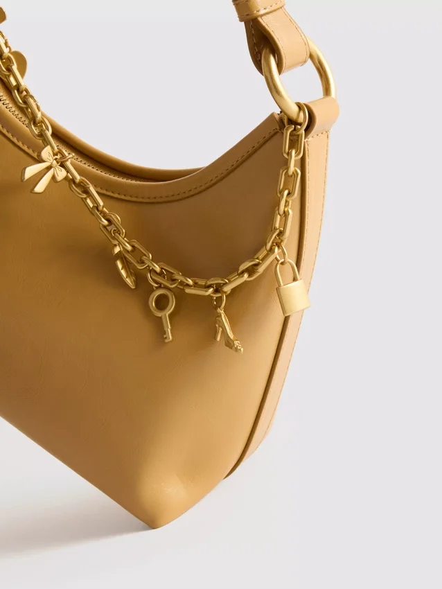 Charm detail shoulder bag