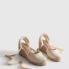 Closed toe tie up wedges