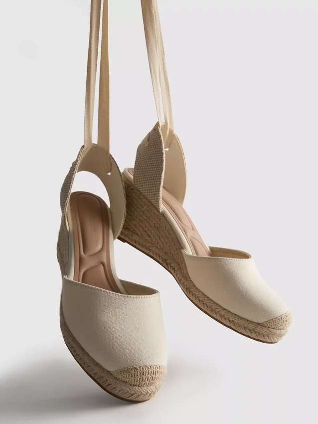 Closed toe tie up wedges