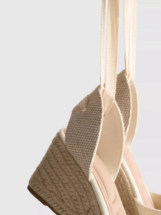 Closed toe tie up wedges