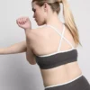 Contrast trim cross-back active crop top