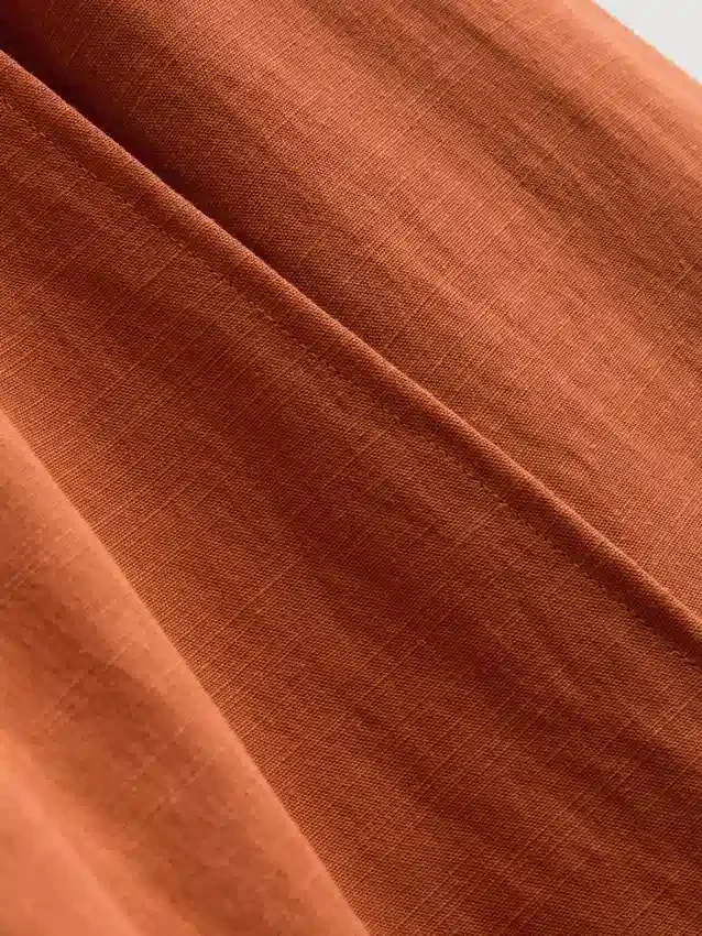 Cotton-blend side-tie midi skirt