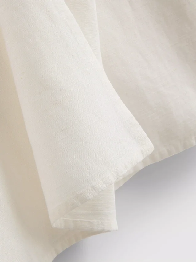 Cotton-blend side-tie midi skirt