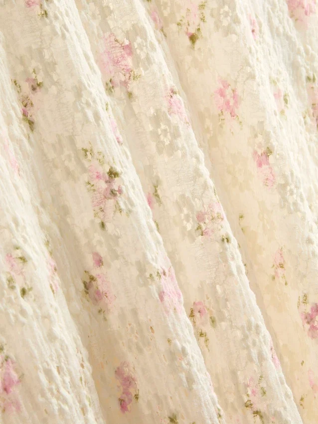 Cotton-blend textured floral midi skirt