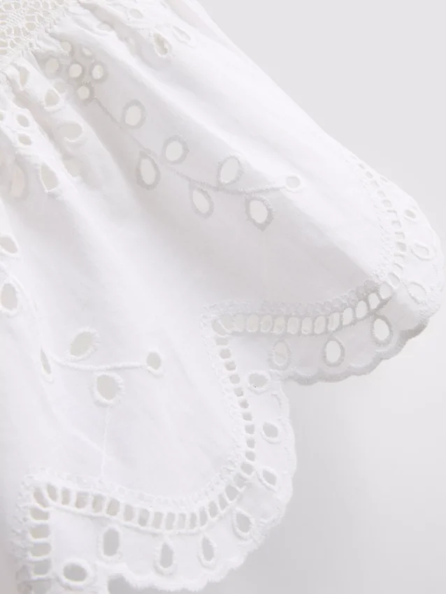 Cotton broderie tie front top