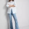 Cotton denim flared mid-rise jeans