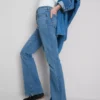 Cotton denim flared mid-rise jeans