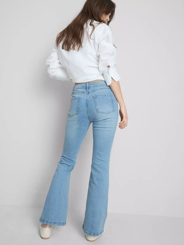 Cotton denim flared mid-rise jeans