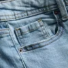 Cotton denim flared mid-rise jeans