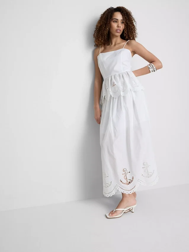 Cotton embroidered peplum hem cami top
