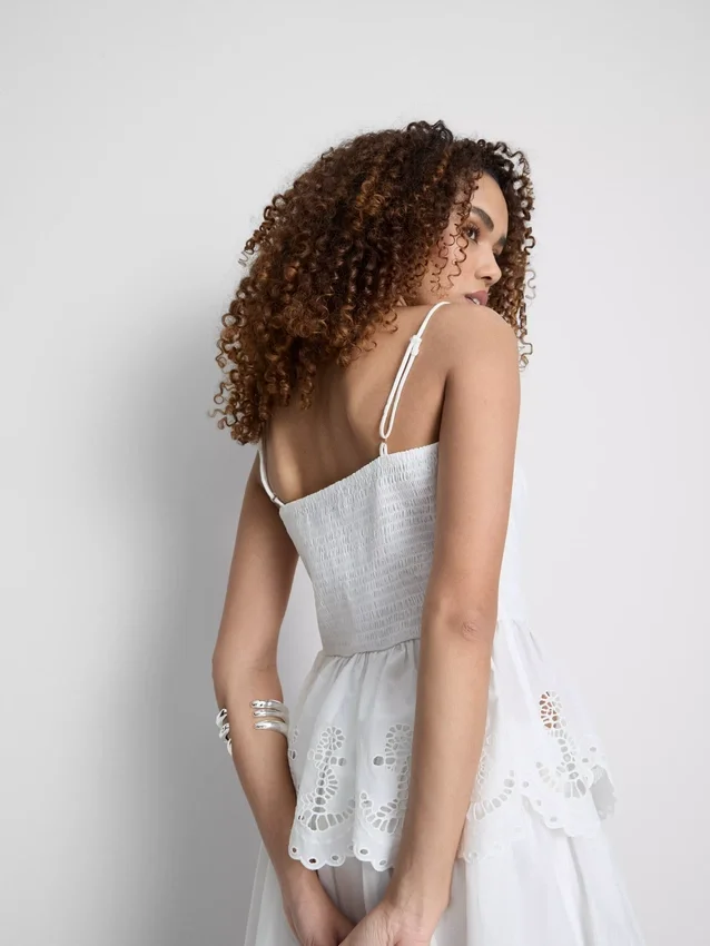 Cotton embroidered peplum hem cami top