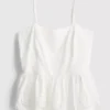 Cotton embroidered peplum hem cami top