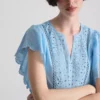 Cotton embroidered scalloped sleeve top