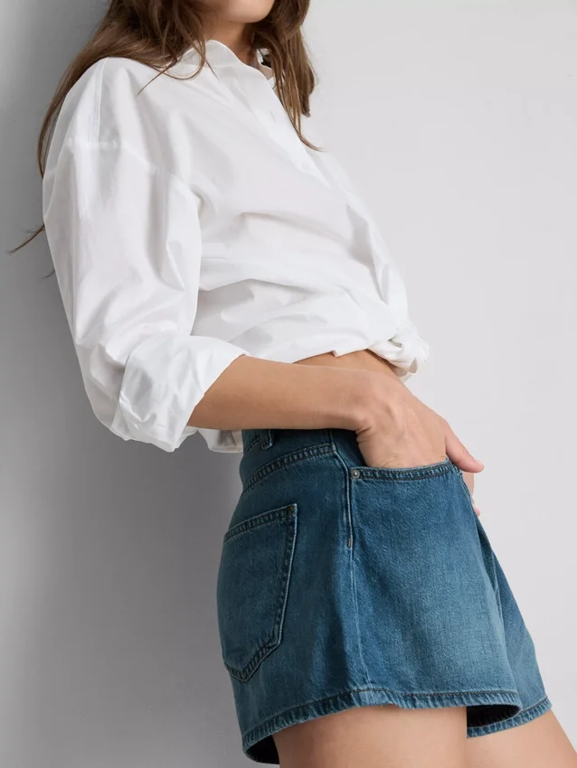 Cotton rich denim pleated flare shorts