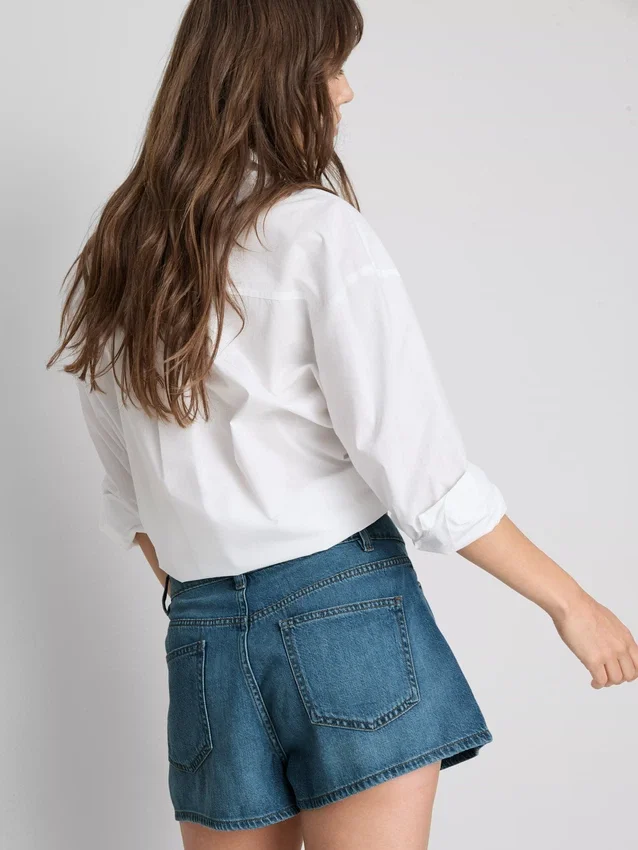 Cotton rich denim pleated flare shorts