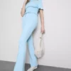 Cotton-rich pintuck flared-leg joggers