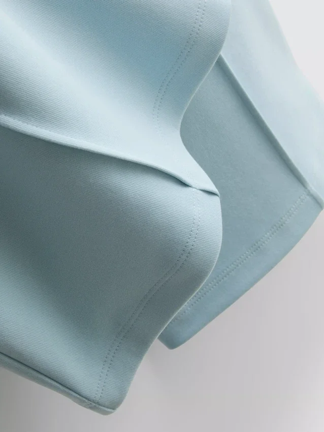 Cotton-rich pintuck flared-leg joggers