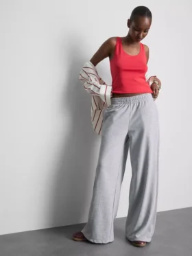 Cotton-rich wide-leg pleated joggers