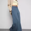 Cotton-rich wide-leg pleated joggers