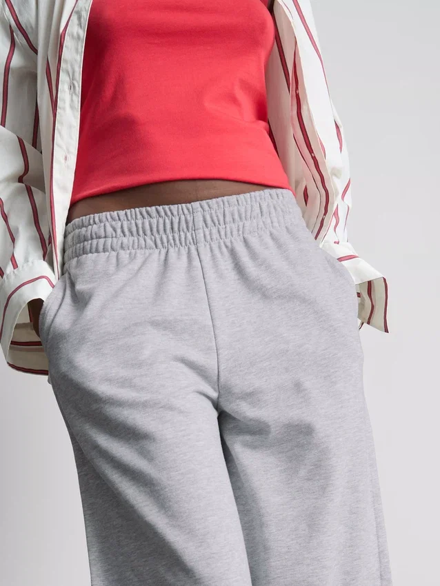 Cotton-rich wide-leg pleated joggers