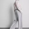 Cotton-rich wide-leg pleated joggers
