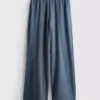 Cotton-rich wide-leg pleated joggers