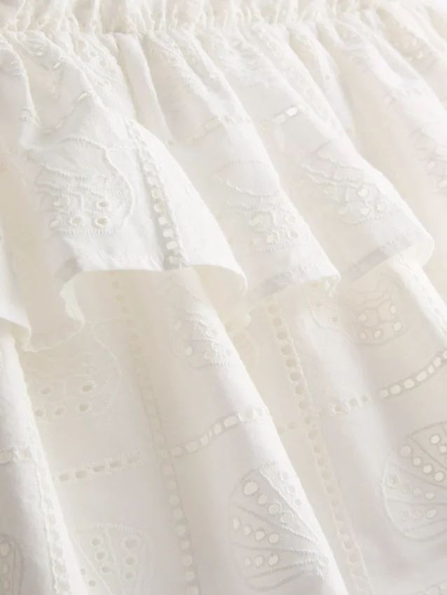 Cotton tiered embroidered mini skirt