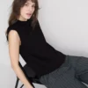 Cropped sleeveless shoulder pad tee