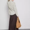Curved-hem relaxed button-down shirt