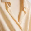Curved-hem relaxed button-down shirt