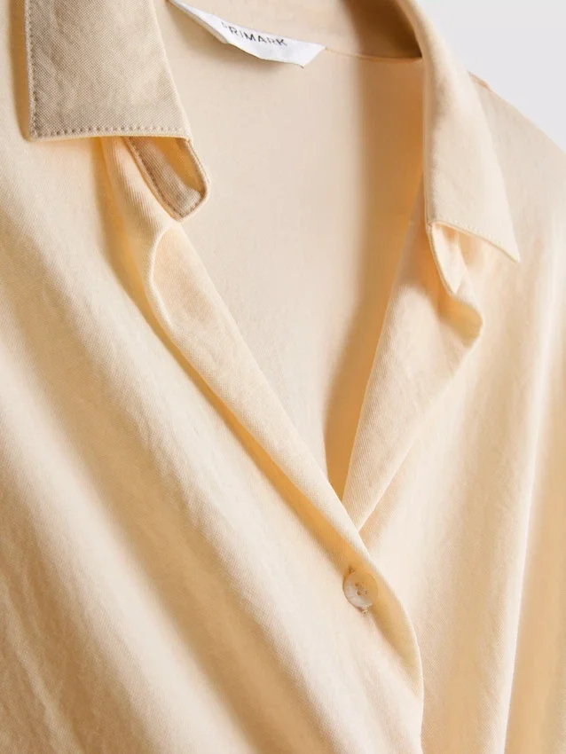 Curved-hem relaxed button-down shirt