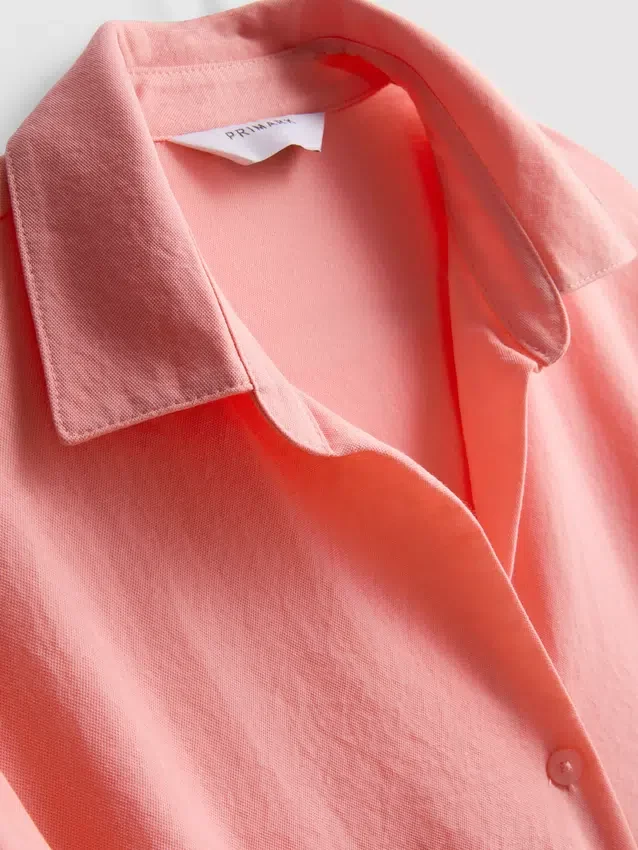 Curved-hem relaxed button-down shirt