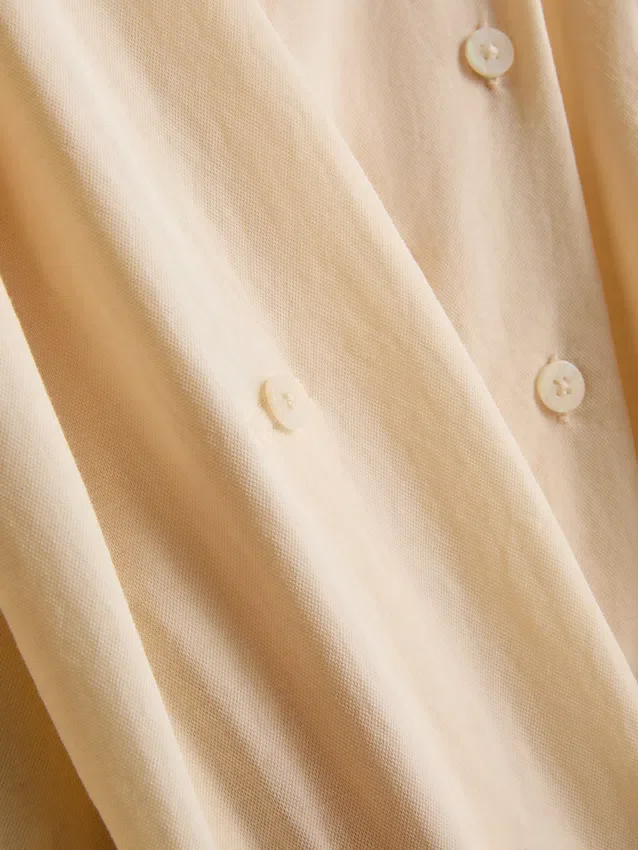 Curved-hem relaxed button-down shirt