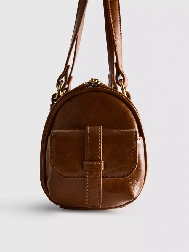 Distressed faux leather bowler bag