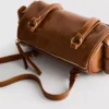 Distressed faux leather bowler bag