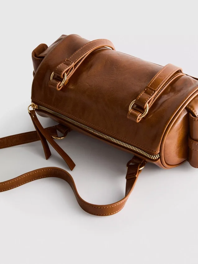 Distressed faux leather bowler bag