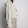 Double-breasted boxy rain jacket