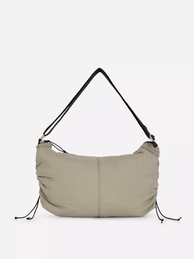 Drawstring detail sling bag