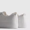 Embroidered daisy sneakers